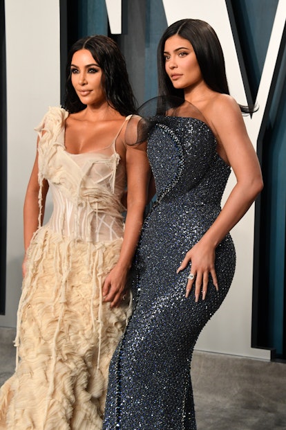 Kim Kardashian and Kylie Jenner attend the 2020 Vanity Fair Oscar Party.