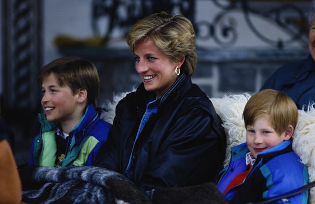 Princess Diana (1961 - 1997) with her sons Prince William (left) and Prince Harry on a skiing holida...