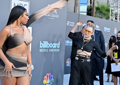 LAS VEGAS, NEVADA - MAY 15: Megan Thee Stallion and Cara Delevingne attend the 2022 Billboard Music ...