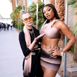 LAS VEGAS, NEVADA - MAY 15: (L-R) Cara Delevingne and Megan Thee Stallion attend the 2022 Billboard ...