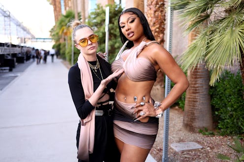 LAS VEGAS, NEVADA - MAY 15: (L-R) Cara Delevingne and Megan Thee Stallion attend the 2022 Billboard ...