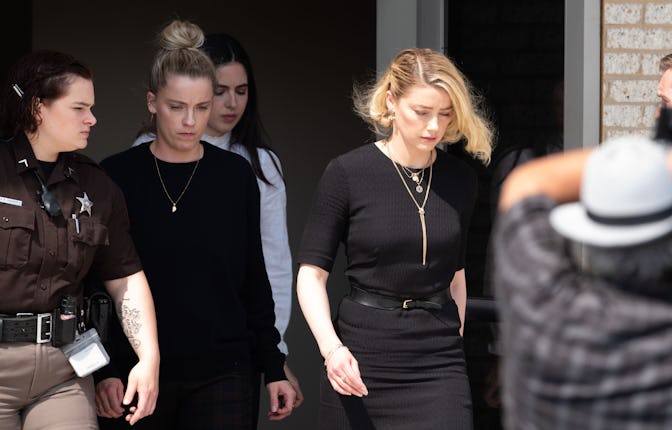 FAIRFAX, VA - JUNE 1: (NY & NJ NEWSPAPERS OUT) Amber Heard departs the Fairfax County Courthouse aft...