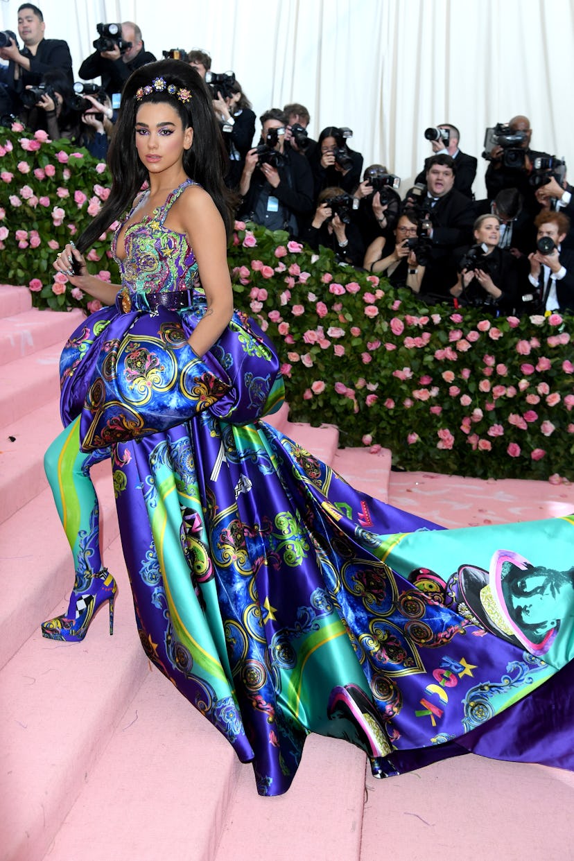 Dua Lipa wearing a custom Atelier Versace look at the 2019 met gala.