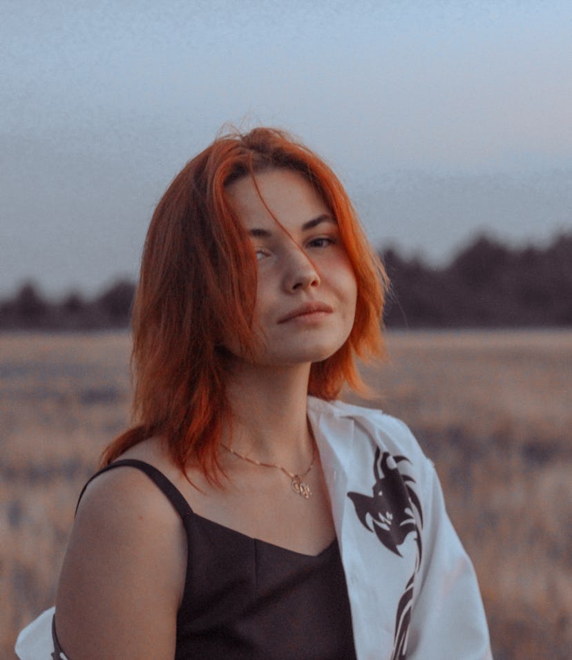 Young woman the night of a full moon. The meaning of a full moon in astrology might be different dep...