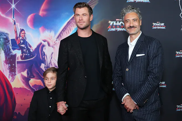 Taika Waititi says his and Chris Hemsworth's kids influenced "Thor: Love and Thunder" monsters. Here...