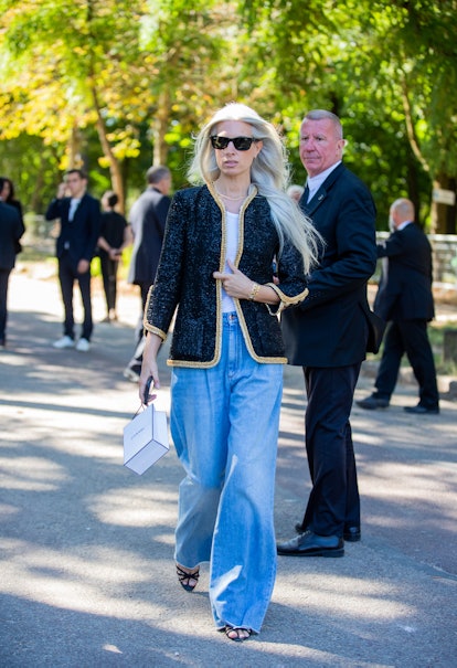 PARIS, FRANCE - JULY 05: Sarah Harris seen wearing wide leg denim jeans, blazer outside Chanel Paris...