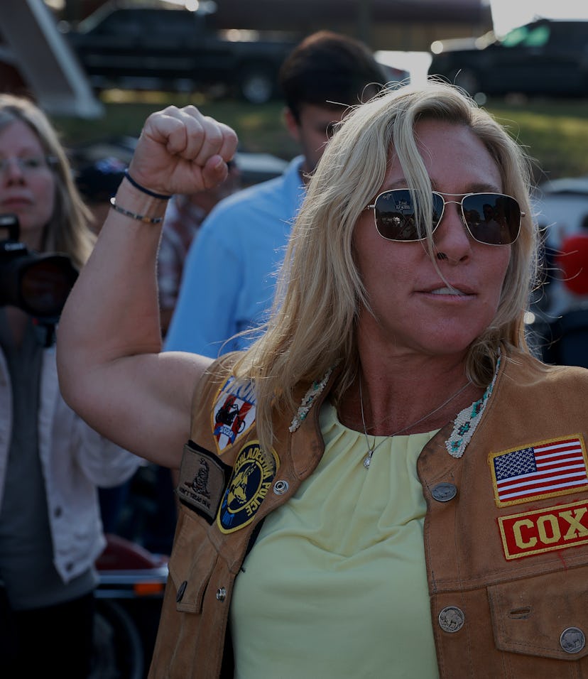 PLAINVILLE, GEORGIA - MAY 20: Rep. Marjorie Taylor Greene (R-GA) flexes her muscles during a Bikers ...