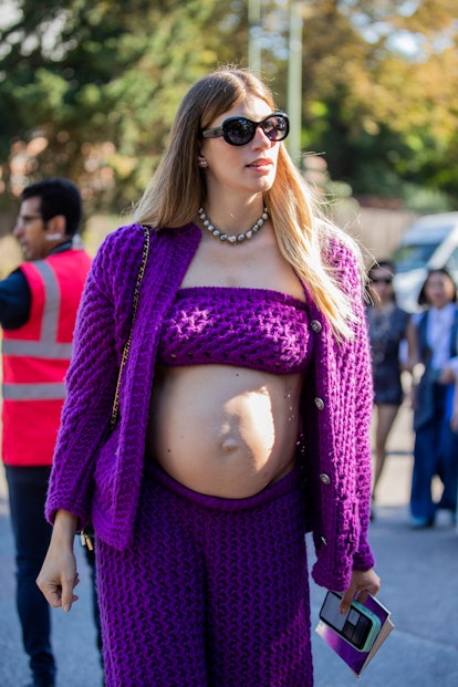 PARIS, FRANCE - JULY 05: Pregnant Veronika Heilbrunner seen wearing purple cropped top, jacket, shor...