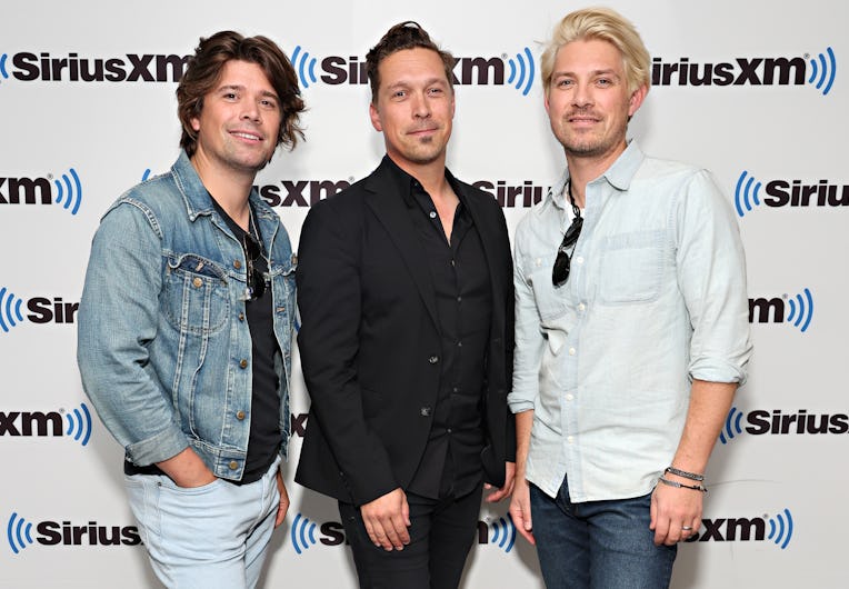 NEW YORK, NEW YORK - MAY 20: Zac Hanson, Isaac Hanson and Taylor Hanson of Hanson visit the SiriusX...