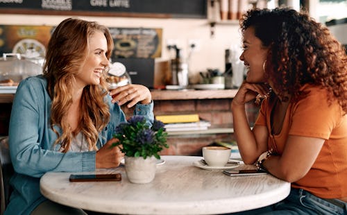 Shot of two young women chatting in a cafe. Here's your july 8 zodiac sign daily horoscope.