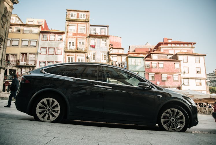 Porto, Portugal - 4 February 2020: An electric Tesla Model X car parked in the city center of Porto,...