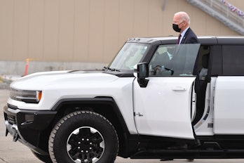 US President Joe Biden test drives a GMC Hummer EV as he tours the General Motors Factory ZERO elect...