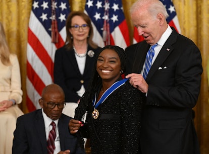 These photos of Simone Biles and Megan Rapinoe's Medal Of Freedom ceremony are too cute.