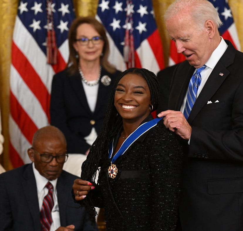 These photos of Simone Biles and Megan Rapinoe's Medal Of Freedom ceremony are too cute.