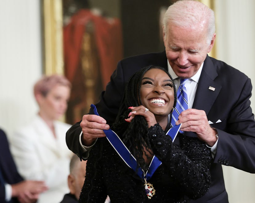 WASHINGTON, DC - JULY 7: U.S. President Joe Biden presents the Presidential Medal of Freedom to Simo...