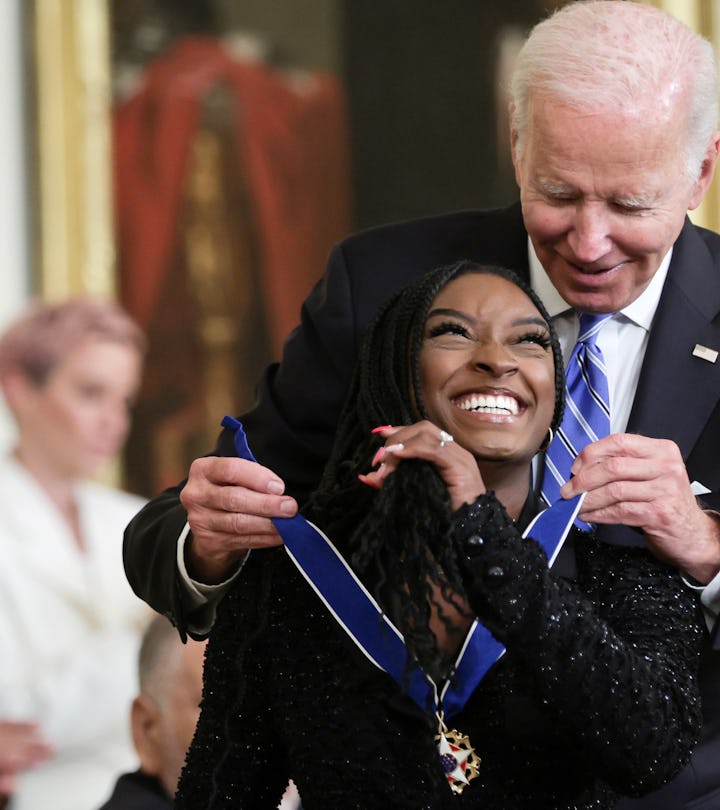 WASHINGTON, DC - JULY 7: U.S. President Joe Biden presents the Presidential Medal of Freedom to Simo...