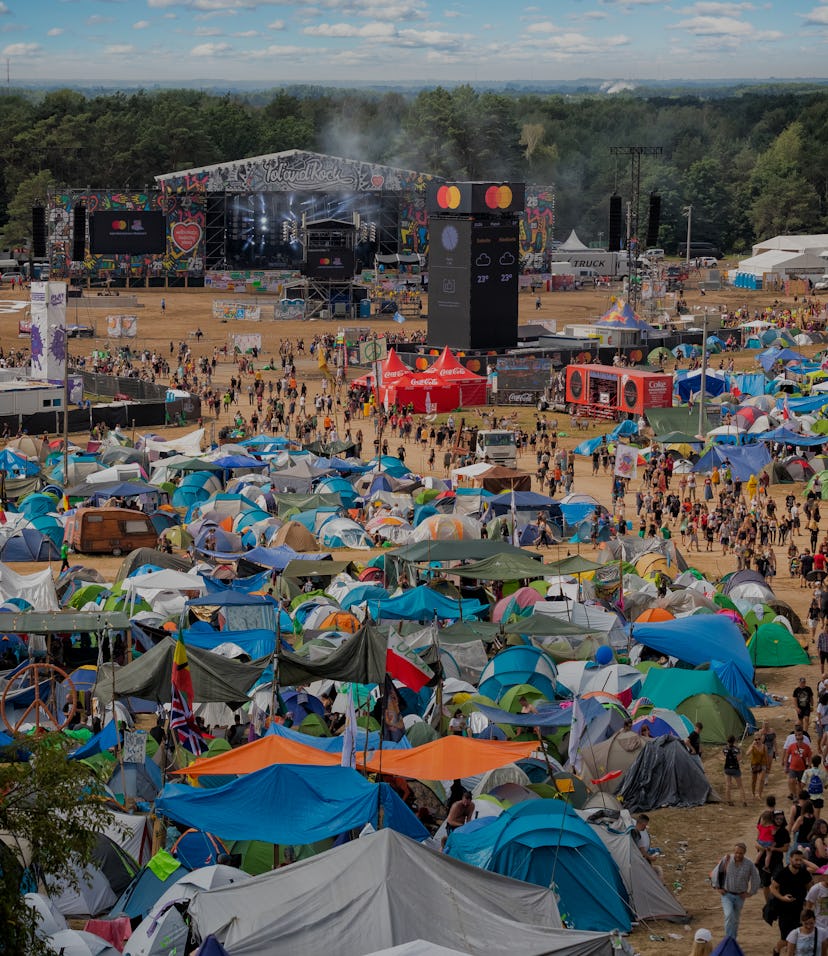 Kostrzyn Nad Odra, Poland - August 02, 2019:Thousands young people walking through the huge campgrou...