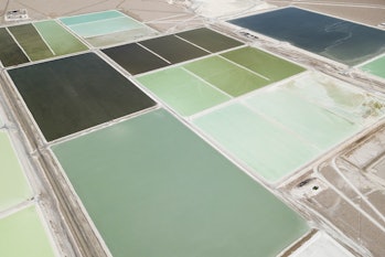 Lithium sits in brine pools at a mine before it can be used to make batteries for electric vehicles.