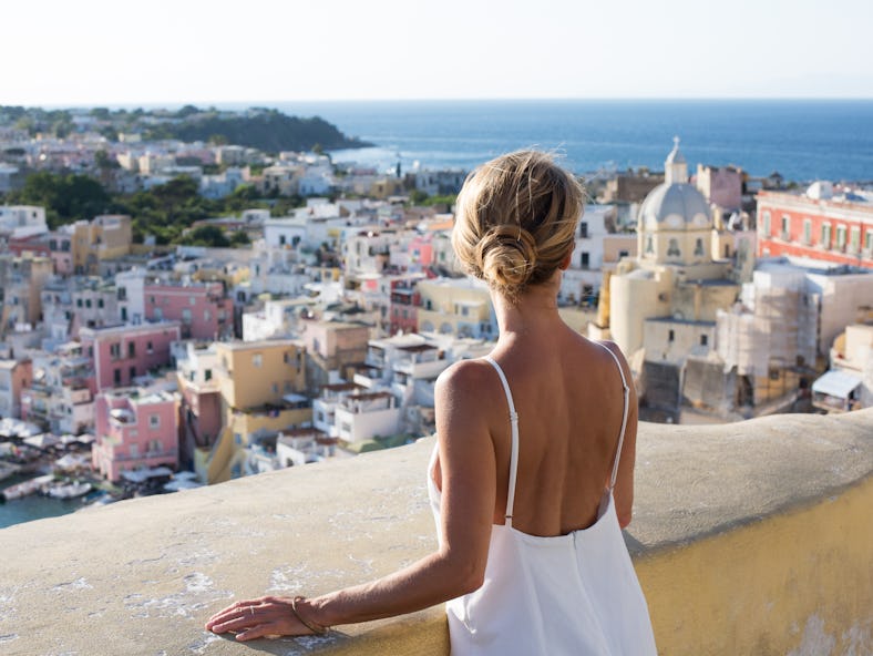 A woman things of the best month to go on vacation, based on her zodiac sign.