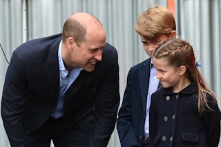 Prince William and Princess Charlotte of Cambridge during a visit to Cardiff Castle on June 04, 2022...