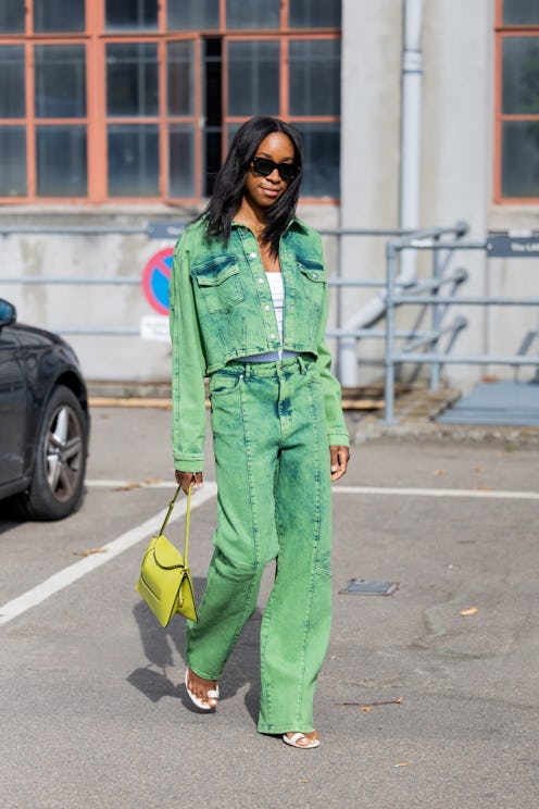 Chrissy Rutherford is seen wearing green denim jacket, jeans outside Gestuz during Copenhagen Fashio...