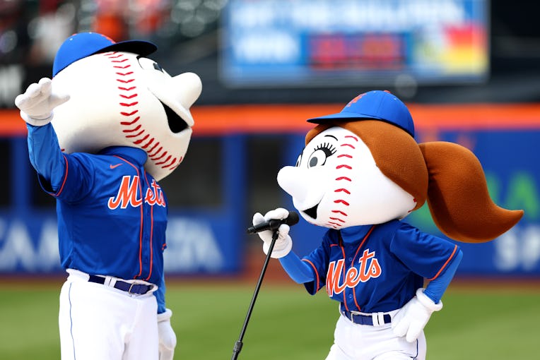 NEW YORK, NEW YORK - MAY 03:  Mr. Met and Mrs. Met perform before game one of a double header betwee...