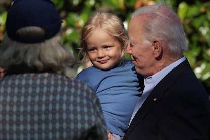 WASHINGTON, DC - JUNE 30:  U.S. President Joe Biden holds up his grandson Beau Biden after he return...