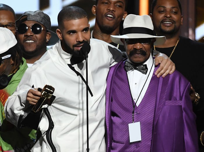 Drake's father Dennis Graham tatted his son's face on his bicep in 2017.