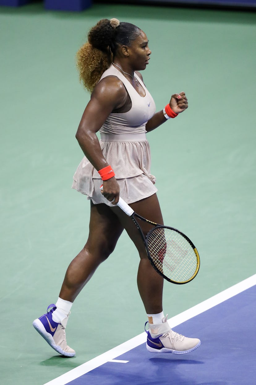Serena Williams of the United States reacts during her Women's Singles semifinal match against Victo...