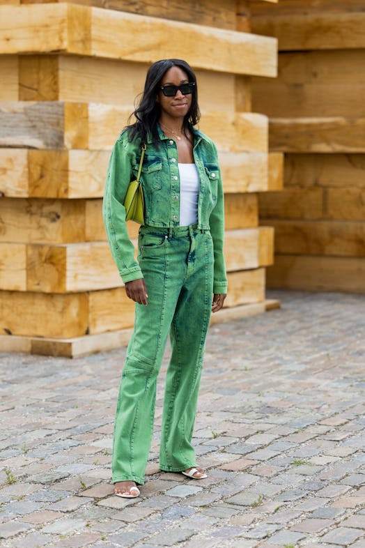 COPENHAGEN, DENMARK - AUGUST 09: Chrissy Rutherford seen wearing green denim jacket, jeans outside L...