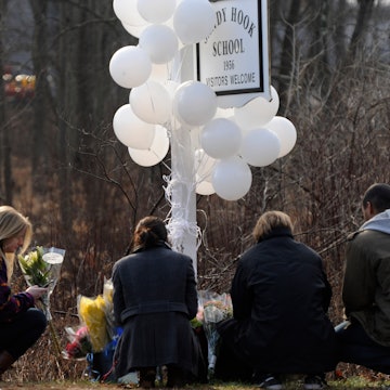 Mourners outside of Sandy Hook Elementary School. One of the mothers of the victims of the Sandy Hoo...