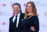 LONDON, ENGLAND - MAY 14: Sean Bean and Ashley Moore attend the Virgin TV BAFTA Television Awards at...