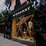 Hong Kong - October 12, 2021 :  Windows of the Burberry are taped in preparation for typhoon Kompasu...