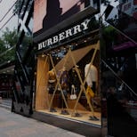 Hong Kong - October 12, 2021 : Windows of the Burberry are taped in preparation for typhoon Kompasu...
