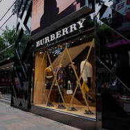 Hong Kong - October 12, 2021 :  Windows of the Burberry are taped in preparation for typhoon Kompasu...