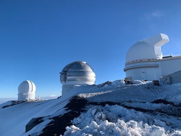 Morning winter view on telescope at summit of Mauna Kea on Big Island of Hawaii, USA. Dark skies, as...
