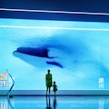 Futuristic Aquatic attraction with mother and her child. This is entirely 3D generated image, includ...