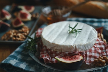 Preparing Baked Camembert Cheese with Fresh Figs