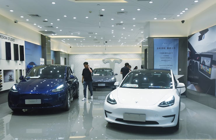 HANGZHOU, CHINA - JUNE 28, 2021 -  customer picks a Tesla car at a Tesla store in Hangzhou, east Chi...