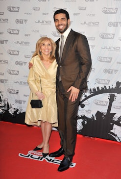 Host/singer Drake (R) with his mother Sandi Graham pose on the red carpet at the 2011 Juno Awards at...