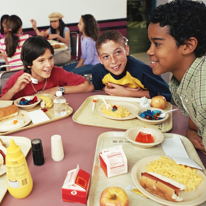 Four kids eating school lunches. California just became the first state to offer free breakfast and ...