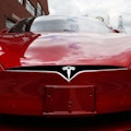 NEW YORK, NY - JULY 05:  A Tesla model S sits parked outside of a new Tesla showroom and service cen...
