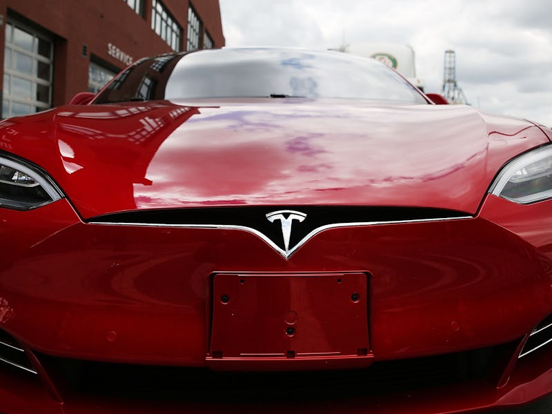 NEW YORK, NY - JULY 05: A Tesla model S sits parked outside of a new Tesla showroom and service cen...