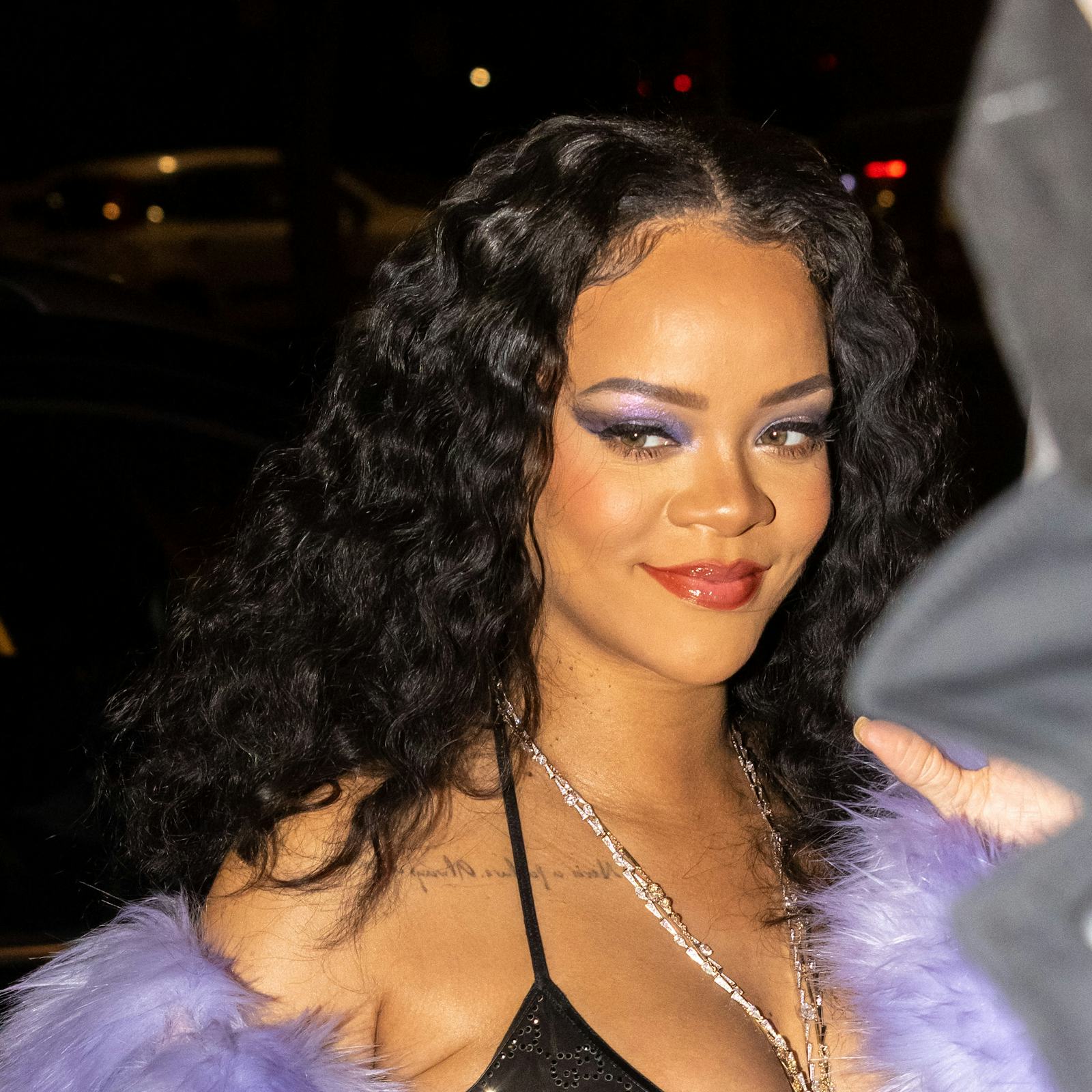 Rihanna's Latest '90s-Inspired Look Stays True To Her Beauty Signatures