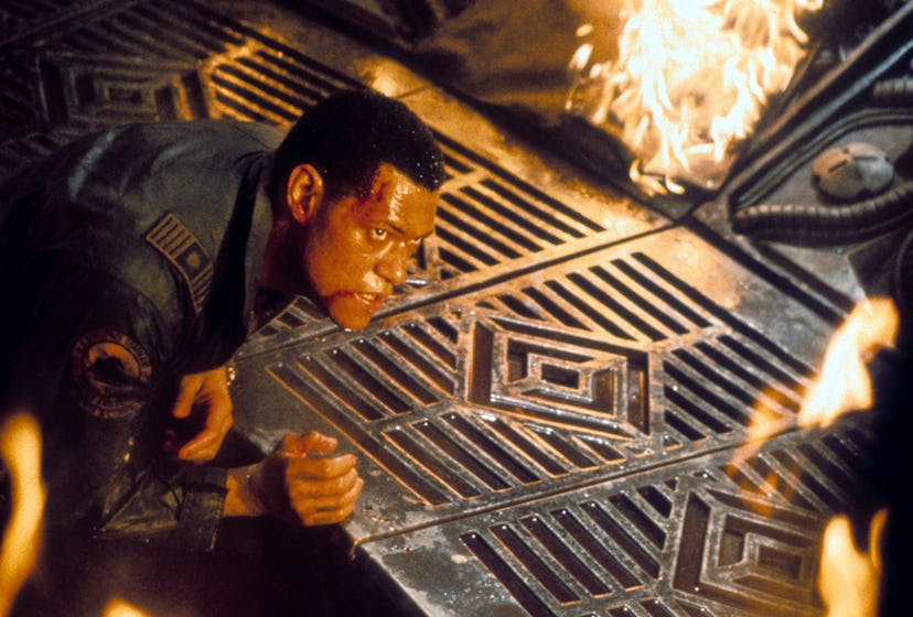 Laurence Fishburne near fiery pit in a scene from the film 'Event Horizon', 1997. (Photo by Paramoun...