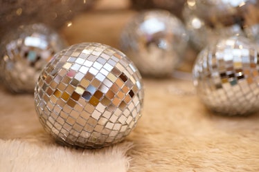 Disco ball decor is part of the '70s theme, which is one of the wedding trends for fall 2022. 