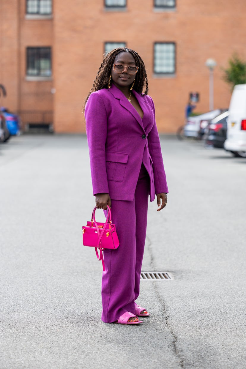 COPENHAGEN, DENMARK - AUGUST 09: Lois Opoku seen wearing purple suit, bag outside Gestuz during Cope...