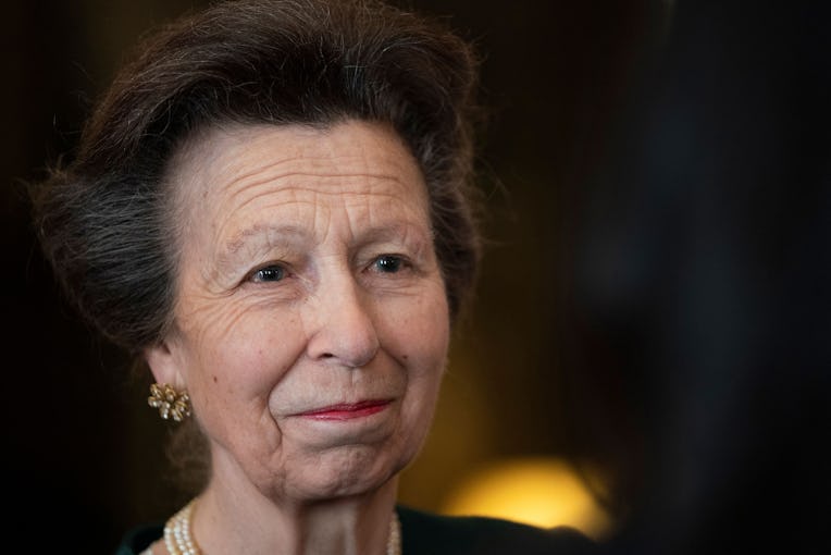 Britain's Princess Anne, Princess Royal, speaks to university representatives during a reception aft...