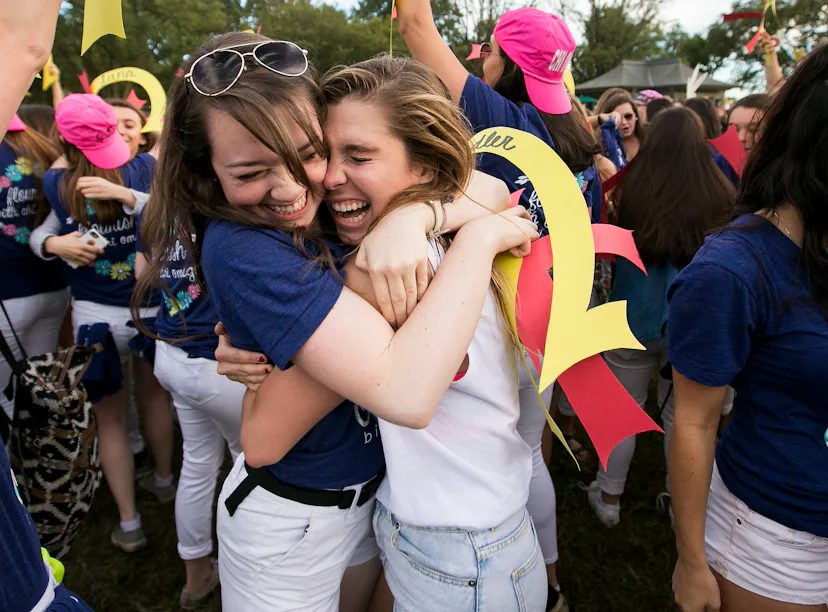 Sorority sisters hug during rush week, which rush week tips from former sorority sisters can help wi...
