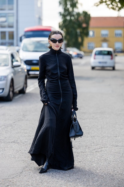 COPENHAGEN, DENMARK - AUGUST 09: A guest is seen outside Rabens Saloner during Copenhagen Fashion We...